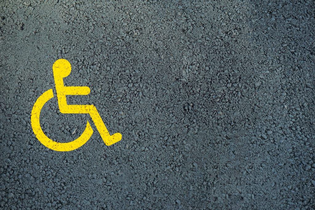 Not Ashamed Month article has a wheelchair symbol on pavement