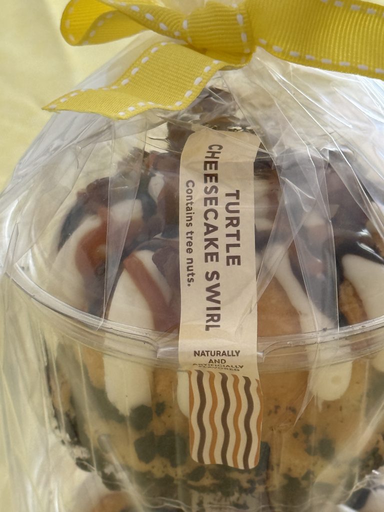 Up close of Nothing Bundt Cake Turtle Cheesecake Swirl.