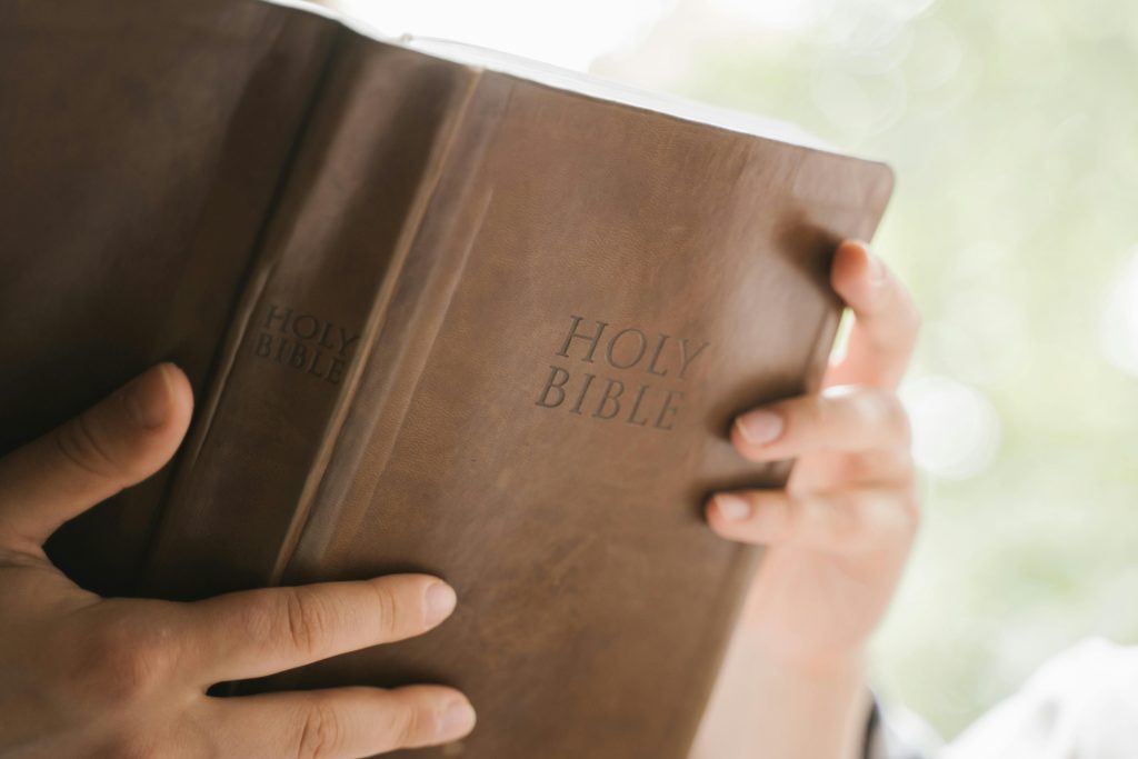 Christianity image of a Bible in someone's hands