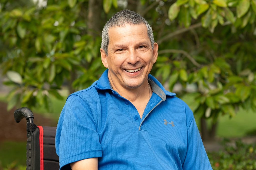 Audacitymagazine has Glenn Moscoso smiling at the camera
